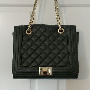 Black quilted handbag